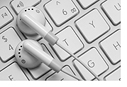 Image: computer keyboard with earphones